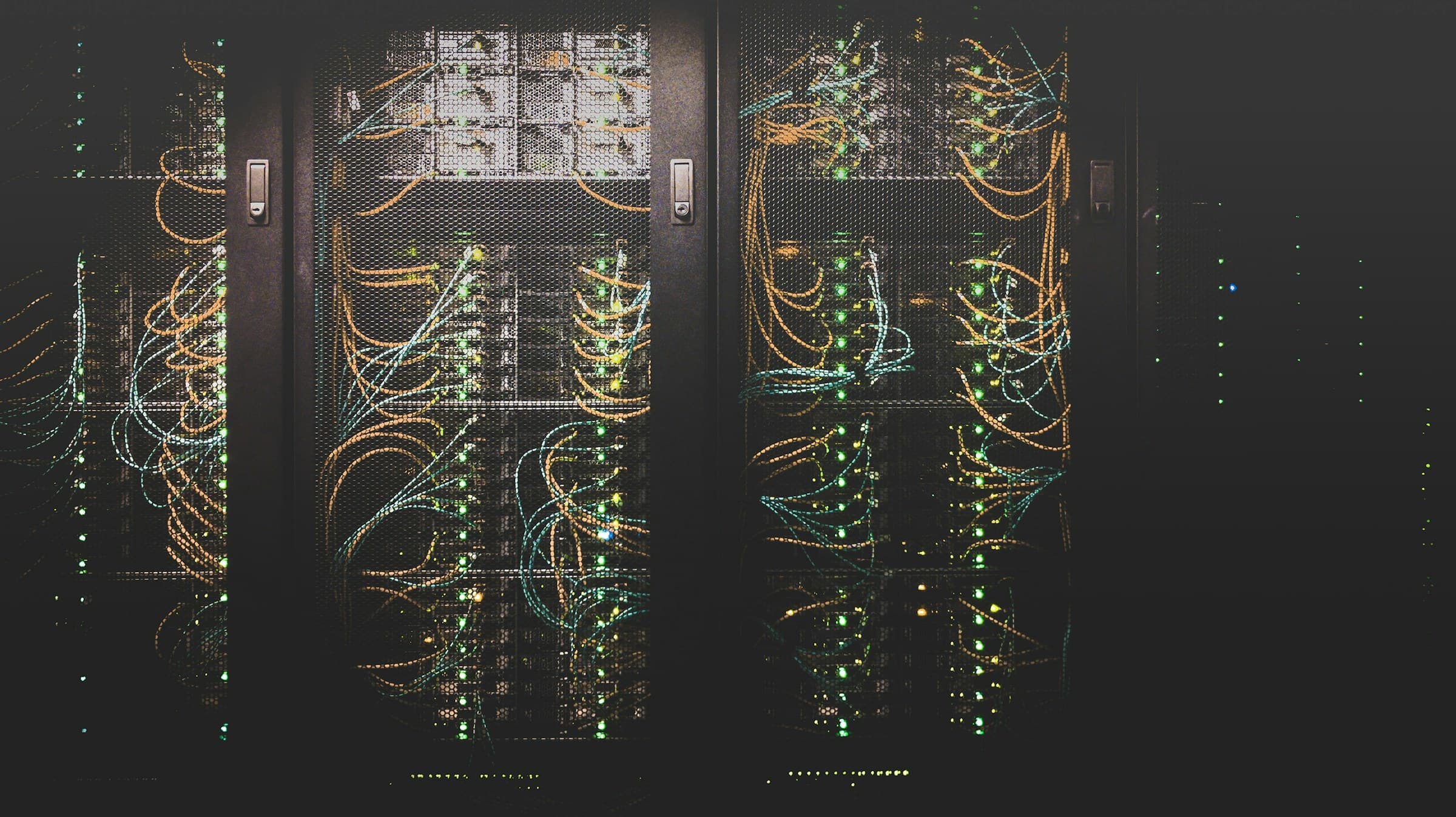 Data-center server racks with status lights and network cabling